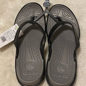 Grey croc flip flops